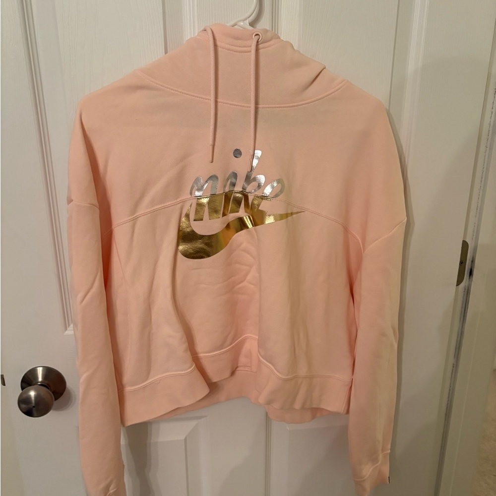 Nike Women's Light Pink Hoodie with Gold and Silver Logo